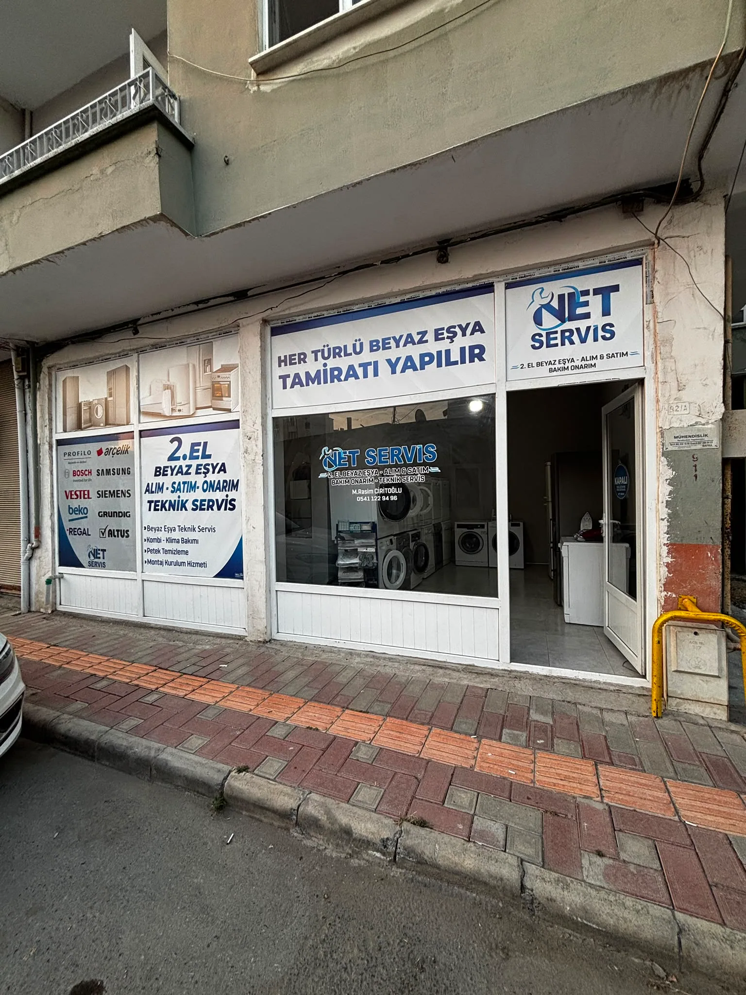 Net Servis mağaza cephesi ve giriş alanı